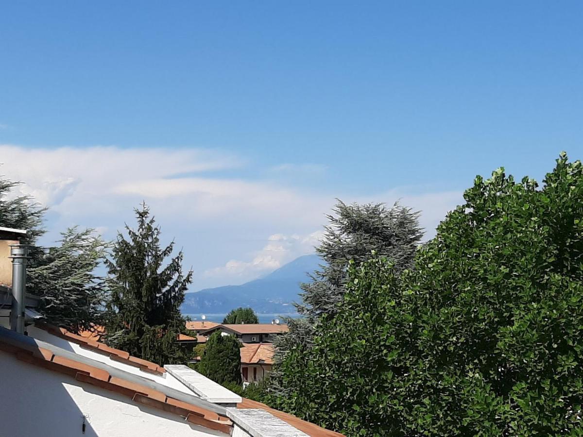 Appartamento Genziana - Con Vista Piscina E Garage Sirmione Exterior foto